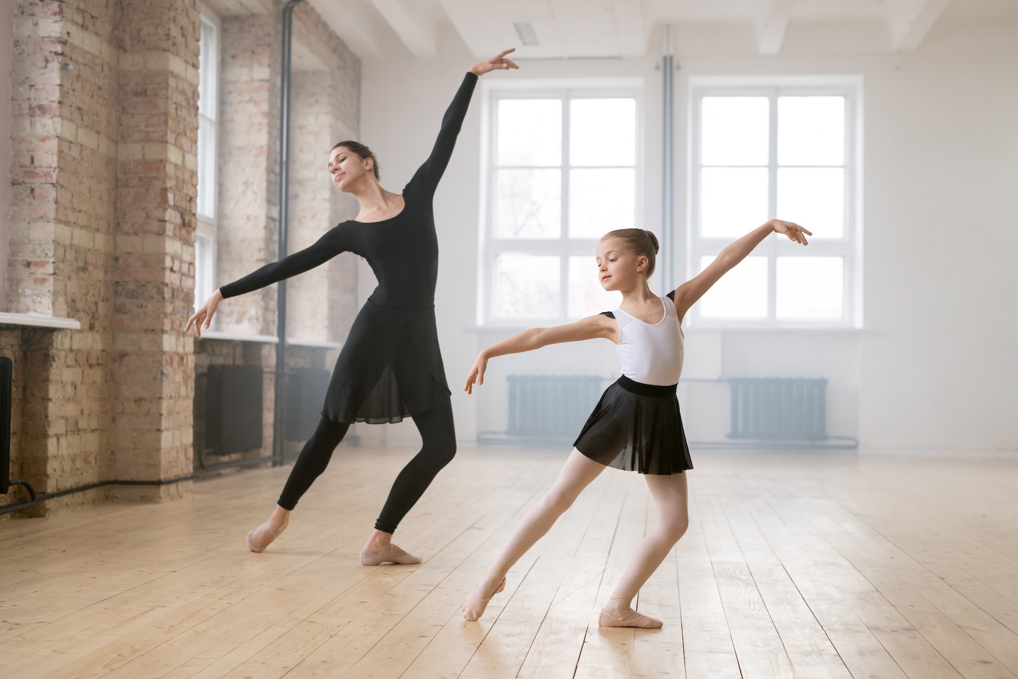 Ballet dancers dancing at studio